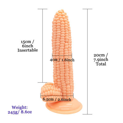 Ein riesiger, realistischer Dildo in Maiskörnchenform