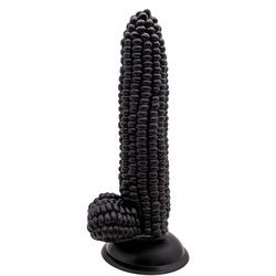 Ein riesiger, realistischer Dildo in Maiskörnchenform