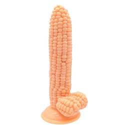 Ein riesiger, realistischer Dildo in Maiskörnchenform