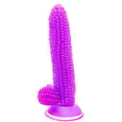 Ein riesiger, realistischer Dildo in Maiskörnchenform