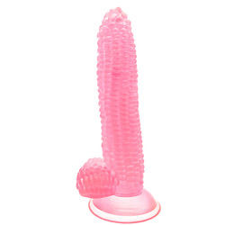 Ein riesiger, realistischer Dildo in Maiskörnchenform