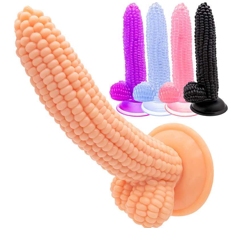 Ein riesiger, realistischer Dildo in Maiskörnchenform